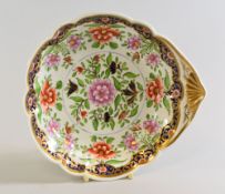 A SWANSEA PORCELAIN SHELL SHAPED DISH decorated in the Imari palette with stylised chrynsanthemum