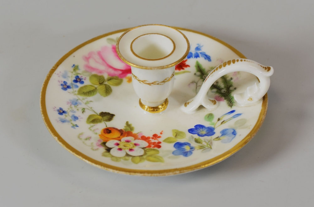 A RARE SWANSEA PORCELAIN CHAMBER CANDLESTICK having a saucer shaped stand with a short tapering