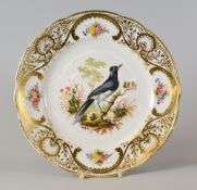 A NANTGARW MACINTOSH SERVICE PLATE painted in London by Robbins & Randall with a black and white