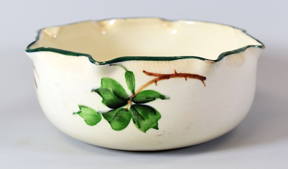 LLANELLY POTTERY BOWL painted with wild-roses and having a crimped rim, stencilled mark to base, - Image 2 of 2