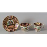 A SWANSEA 'JAPAN' PATTERN TRIO of cups and saucer, the interior of the cups and saucer profusely