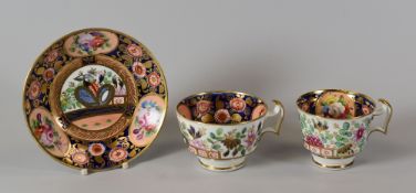 A SWANSEA 'JAPAN' PATTERN TRIO of cups and saucer, the interior of the cups and saucer profusely