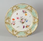 A NANTGARW PORCELAIN LONDON DECORATED PLATE having a lobed rim, the border with finely moulded and