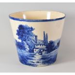 A RARE LLANELLY POTTERY JARDINIERE painted all round in blue by Samuel W Shufflebotham with a