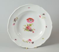 A RARE SHAPED SWANSEA PORCELAIN SOUP PLATE having a notched and lobed rim, the border without