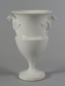 A SWANSEA PORCELAIN UNDECORATED URN VASE with twin eagle-form handles and having a flared rim and