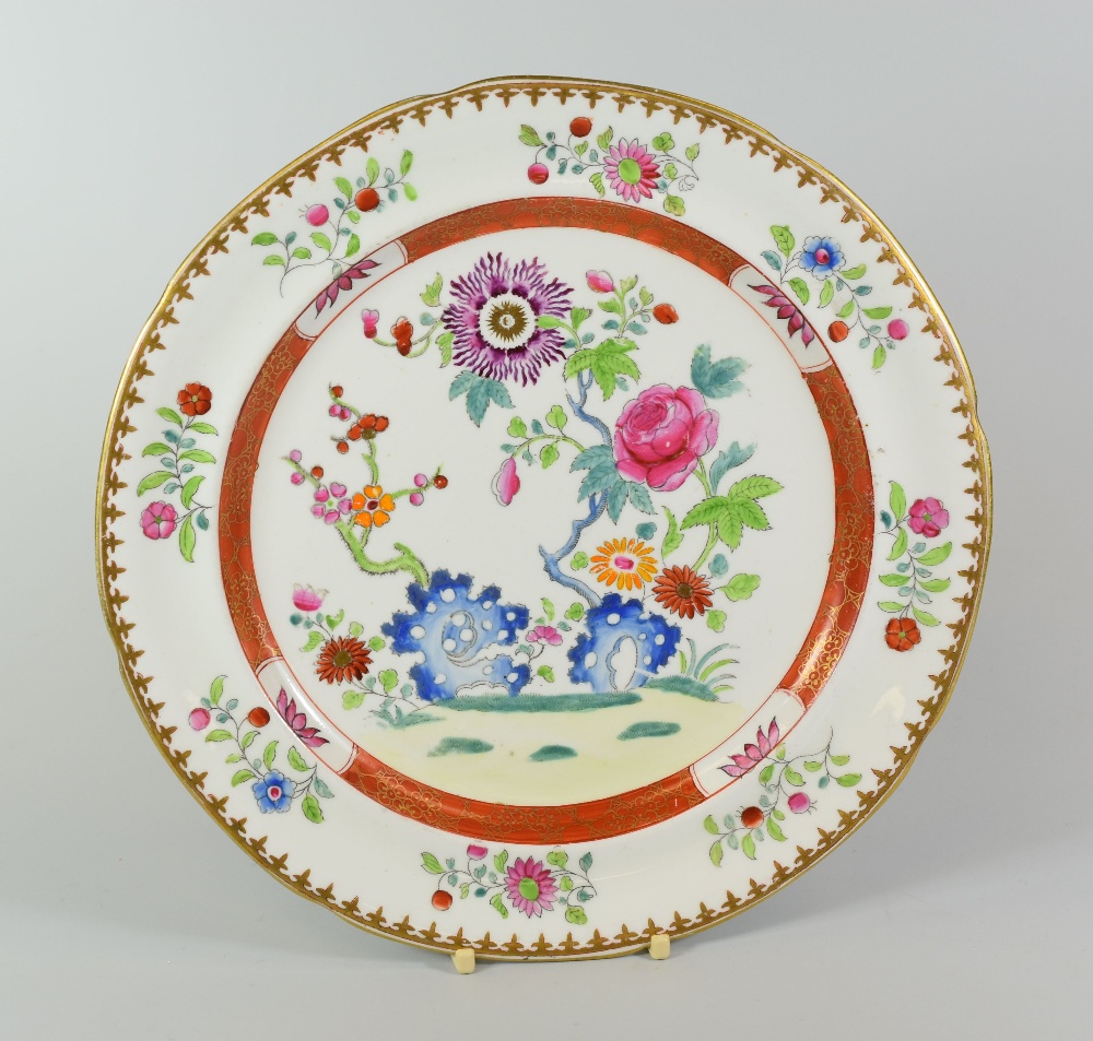 A SWANSEA PORCELAIN FAMILLE ROSE PLATE of circular, slightly lobed form, decorated with sprigs of