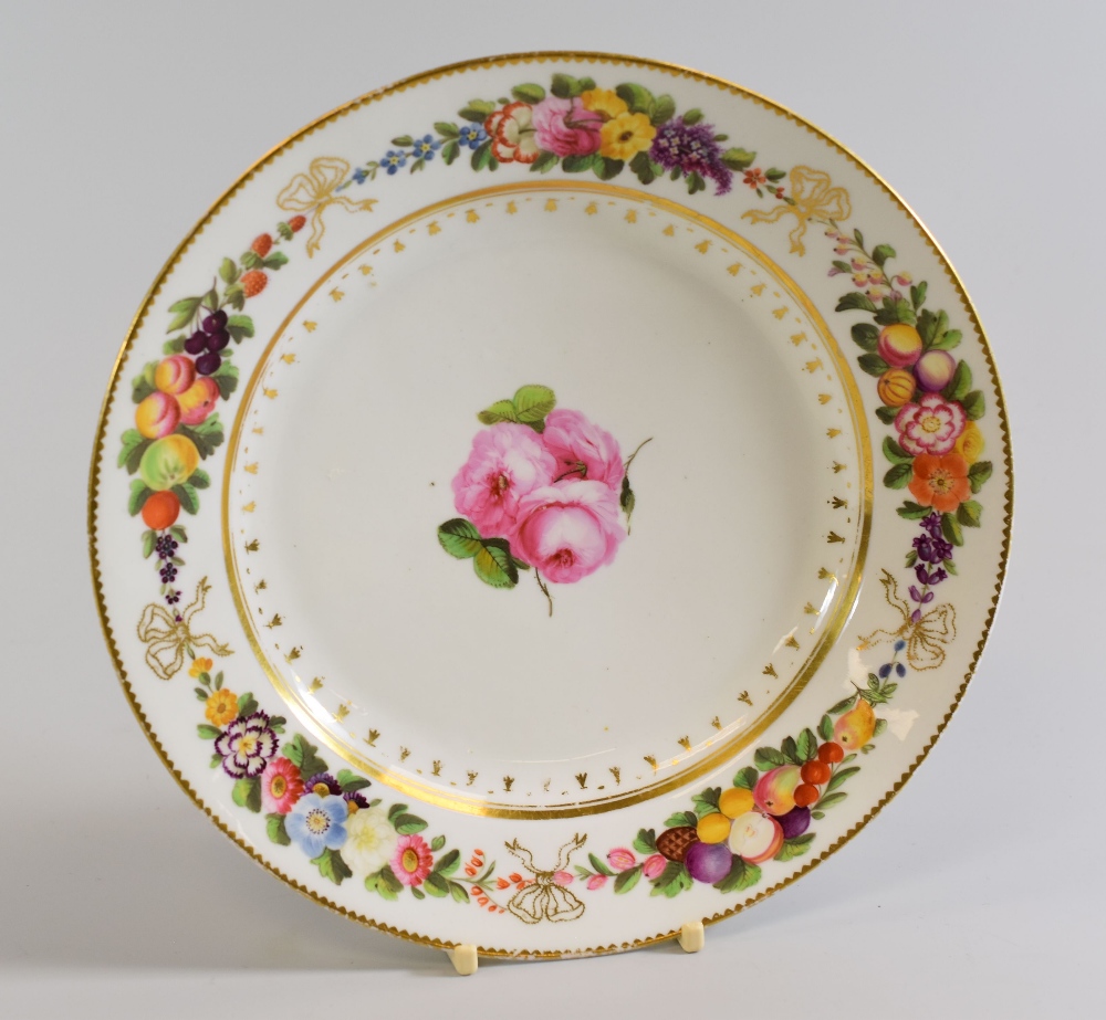 A SWANSEA PORCELAIN PLATE decorated with three roses to the centre and the border with alternating