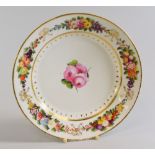 A SWANSEA PORCELAIN PLATE decorated with three roses to the centre and the border with alternating