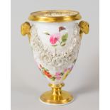 SWANSEA PORCELAIN URN SHAPED VASE having twin ram's head handles, a thick everted rim and the body