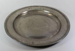 18TH CENTURY PEWTER CHARGER of plain form and believed to be connected to Bassaleg, Gwent as