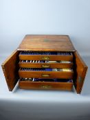 A WALKER & HALL PART CANTEEN OF ELECTROPLATE CUTLERY IN AN OAK CABINET, the two door cabinet with
