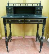 AN EDWARDIAN EBONIZED MAHOGANY SMALL WRITING DESK having a galleried and shelf back with two small