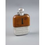 A GARRARD`S SILVER, LEATHER & GLASS HIP FLASK, the removable cup with presentation inscription for `