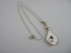 A FINE LINK WHITE METAL NECK CHAIN with a pear drop pendant, gold backed with pear shaped aquamarine