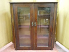 A STAINED PINE TWO DOOR BOOKCASE TOP with glazed panels