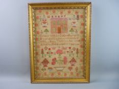 A SAMPLER by Mary Thomas, Aged 13, 1844 and depicting a house and vases of flowers etc, 44 x 31 cms