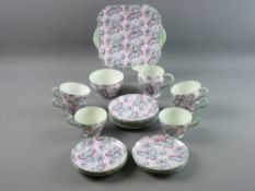 A TWENTY ONE PIECE SHELLEY 'SUMMER GLORY' BONE CHINA TEA SERVICE comprising sandwich plate, milk