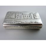 A NATHANIEL MILLS CASTLE TOP SILVER SNUFF BOX of rectangular form with gilt interior showing