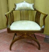 AN EDWARDIAN MAHOGANY & STRING INLAID RIBBED BACK ELBOW CHAIR with floral padded shaped back rail