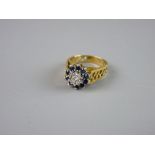 AN EIGHTEEN CARAT GOLD DRESS RING the shank of pierced graduated form and having a centre diamond,