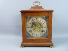 AN ENGLISH WALNUT CASED BRACKET CLOCK, the pagoda style case housing a square brass dial with chased