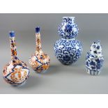 A PAIR OF EARLY 20th CENTURY IMARI ONION SHAPED BOTTLES, 14.5 cms high, a small 18th Century blue