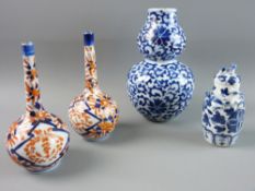 A PAIR OF EARLY 20th CENTURY IMARI ONION SHAPED BOTTLES, 14.5 cms high, a small 18th Century blue