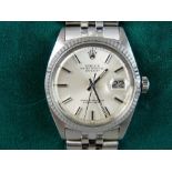A 1980's GENTLEMAN'S ROLEX STAINLESS STEEL ENCASED OYSTER DATEJUST WRISTWATCH with Swiss automatic