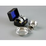 A GROUP OF SMALL SILVER to include a cased pair of napkin rings, Chester 1906 (monogrammed), an