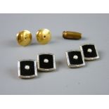 A PAIR OF EIGHTEEN CARAT PLATINUM & BLACK ENAMEL CUFFLINKS, a pair of matching studs, each having