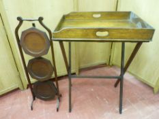 A VINTAGE OAK BUTLER'S TRAY ON STAND and a mahogany three tier cakestand, 60 x 44.5 cms the tray