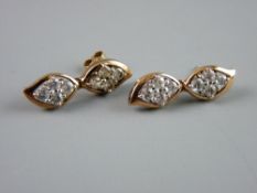 A PAIR OF NINE CARAT ROSE GOLD DOUBLE DROP EARRINGS, each drop having four round czs, 6 grms