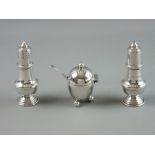 A PAIR OF SILVER SALT & PEPPER CONDIMENTS, 2.5 troy ozs, Birmingham 1990 and a plain egg shaped