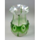 A LOETZ STYLE IRIDESCENT GLASS VASE, fluted rim with green rib and bullseye collar decoration with