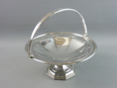 A CIRCULAR SILVER TAZZA on an octagonal pedestal base and having a triple lined border with swing
