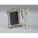 A SILVER TROPHY CUP 'EISTEDDFOD HOREB 1930', 3.5 troy ozs, Birmingham 1929 and a silver easel