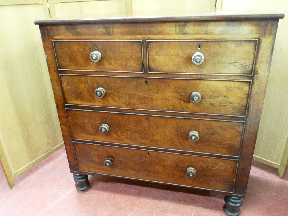 A VICTORIAN MAHOGANY CHEST of two short over three long drawers, the cockbeaded edge drawers with