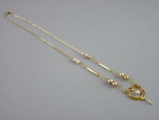 A NINE CARAT GOLD FINE LINK CHAIN with seed pearl drops and heart shaped double strand pendant, 2.