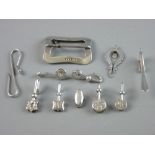 A COLLECTION OF SILVER SKIRT LIFTERS, eight various designs and styles, two white metal lifters