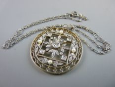 A DELICATE SILVER OBLONG LINK NECK CHAIN with a finely decorated circular gold backed pendant having