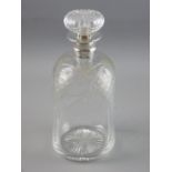A CUT GLASS DIMPLE SHAPED DECANTER WITH SILVER COLLAR, the body cut with grape and vine leaf