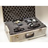 A PHOTOGRAPHY EQUIPMENT HARD CASE containing four Pentax cameras with auxiliary lenses
