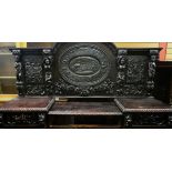 AN IMPOSING NINETEENTH CENTURY CARVED OAK BUFFET SIDEBOARD RELATING TO THE WEDGWOOD