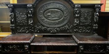 AN IMPOSING NINETEENTH CENTURY CARVED OAK BUFFET SIDEBOARD RELATING TO THE WEDGWOOD