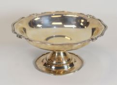 A SILVER TAZZA having a feathered lobed border with four acanthus leaf sections, Sheffield 1926, 9.
