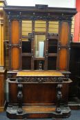 A LARGE CARVED OAK HALL-STAND, 229cms high x 130cms wide