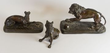 THREE METALLIC MODELS of a greyhound on a platform base, a lion with ball and a seated wolf