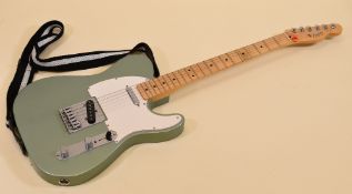 A FENDER TELECASTER ELECTRIC GUITAR in sage green with white scratchplate, serial number MZ2013616