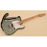 A FENDER TELECASTER ELECTRIC GUITAR in sage green with white scratchplate, serial number MZ2013616